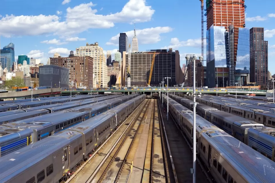 View of trainsin Hundson Yards and New York City skyline.